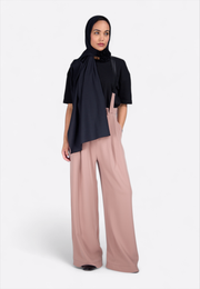 Close-up of rose wide-leg silk trousers, front view – East Vibe